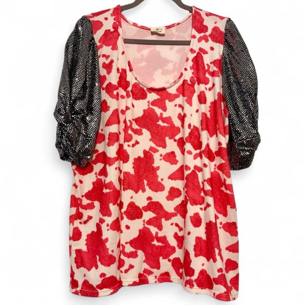 EUC pink cow print top with sequin sleeves